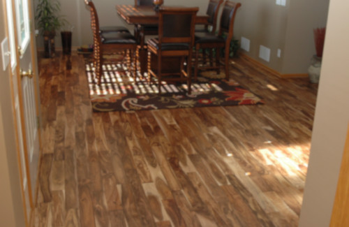 Wood flooring installed in an open dining and living area